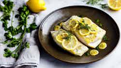 Baked Fish with Lemon and Garlic Sauce (Samak Bil-Limoun)
