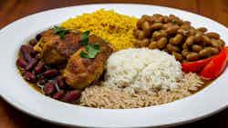 Belizean Stewed Chicken With Rice And Beans