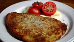 Breaded Beef With Tomato And Cheese (milanesa A La Napolitana)