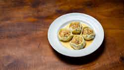 Cheese Dumplings In Sweetened Milk (rasabali)