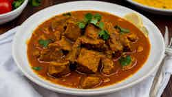 Curry Goat with Roti (Curry de Chèvre avec Roti)