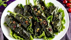 Dolmades Me Ryzi Kai Aromata (stuffed Grape Leaves With Rice And Herbs)