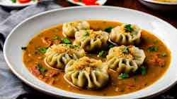 Fish Dumplings In Gravy (chitol Macher Muitha)