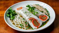 Fresh Rice Noodle Rolls with Pork and Herbs (Bánh cuốn thịt)