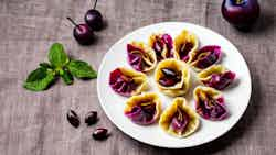 Gomboti Cu Prune (aromatic Plum Dumplings)