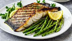 Grilled Sea Bass with Lemon and Herb Butter (Bar grillé au beurre citronné et aux herbes)