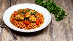 Jollof Spaghetti With Chicken