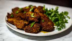 Kabrit Ak Pikliz (fried Goat With Pikliz)