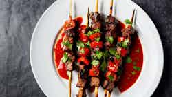 Kribi Spicy Goat Skewers With Tomato Relish