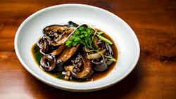 Mo Gu Han Shui Shen (braised Sea Cucumber With Mushrooms)