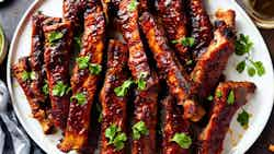 Siniyat Bil Laham (qatari Spiced Lamb Ribs With Date Glaze)