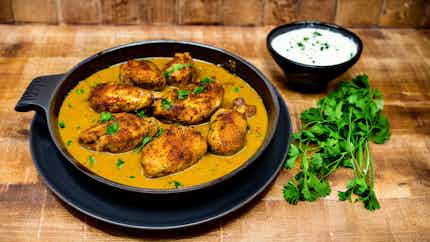 Chicken In Roasted Coconut Gravy (kozhi Varutharacha Curry)