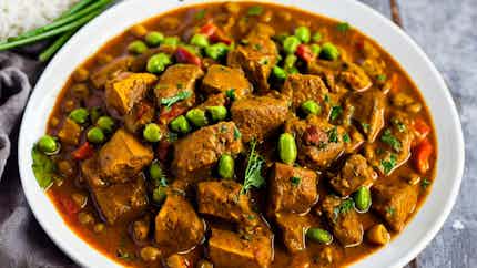 Curried Goat With Rice And Peas