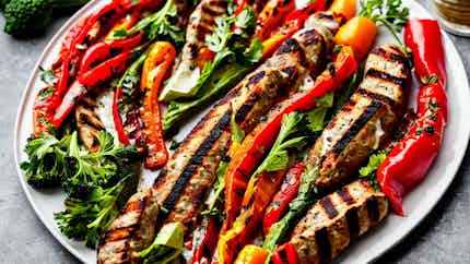Grilled Sausage With Roasted Red Pepper Spread And Grilled Vegetables (bulgarian Barbecue: Kebapche With Lutenitsa And Grilled Vegetables)