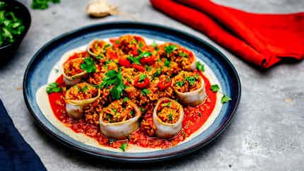 Kalamar Mahshi (stuffed Squid With Spiced Rice And Spicy Tomato Sauce)