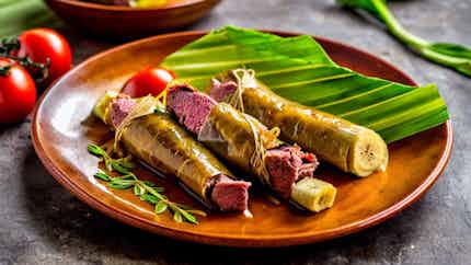Steamed Banana Leaf Wrapped Meat (luwombo)