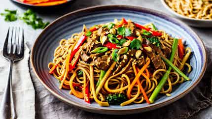 Tibetan Yak Noodle Stir-fry With Spicy Peanut Sauce