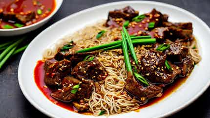 Zi Ran Yang Rou (spicy Manchu Cumin Lamb)